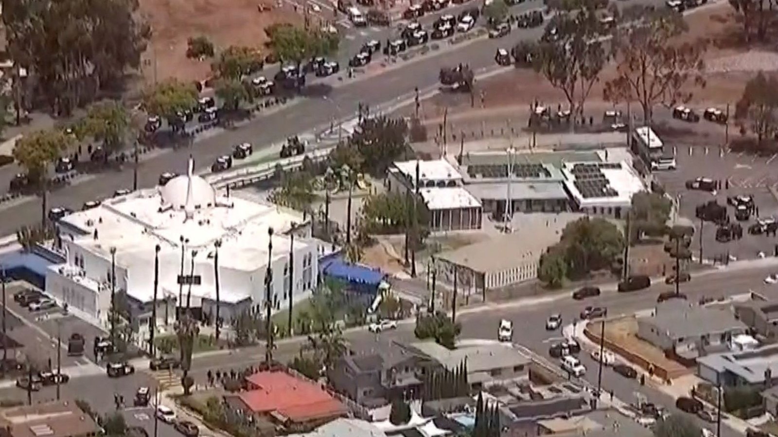 Three killed after two teenagers open fire at California mosque