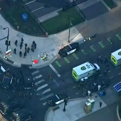 Two dead and several injured after apartment block shooting